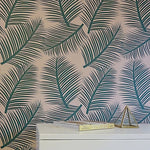 Load image into Gallery viewer, This stunning tropical green and pink wallpaper designed and printed in England in striking colours allows you to add a light and airy yet elegant element to any room in your home.
